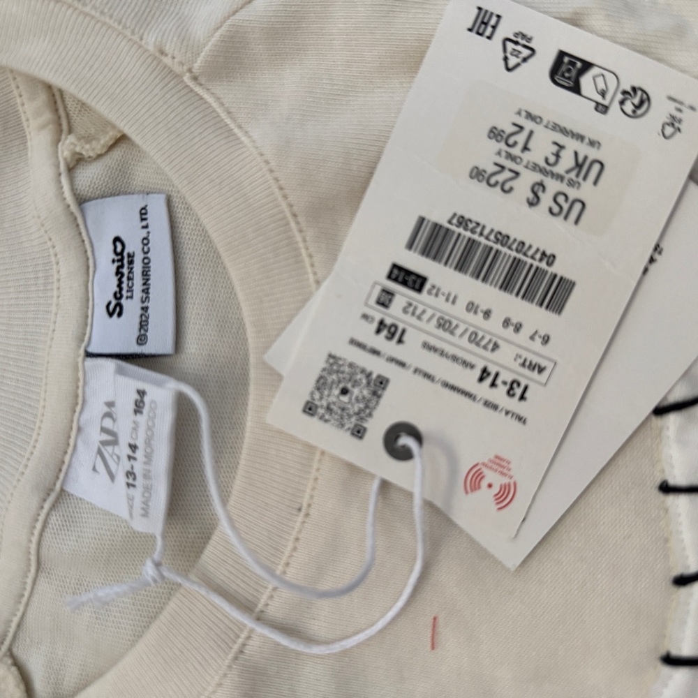 Zara Cream Graphic Tee with Pink and Black Accents